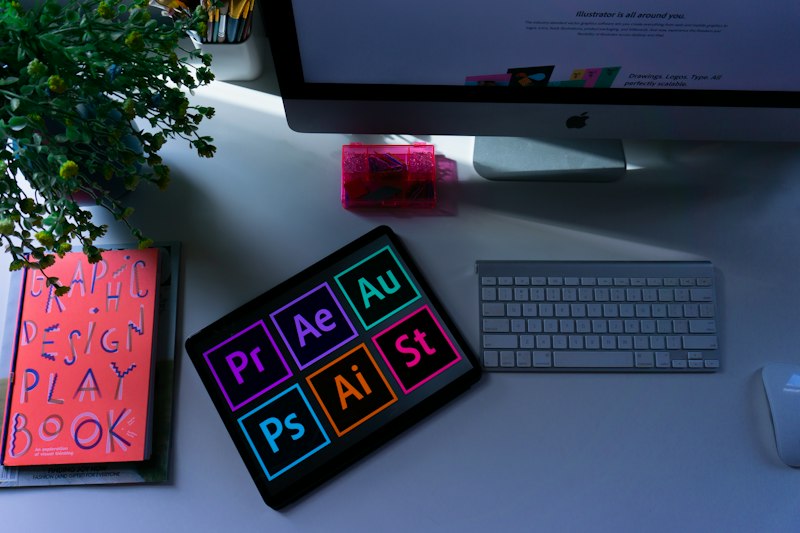 A designer working with a tablet and colour swatches